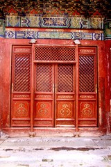 Red wooden temple doors in Mongolia