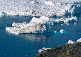 Iceberg and ice from glacier in arctic nature landscape in Ilulissat,Greenland. Aerial drone photo...