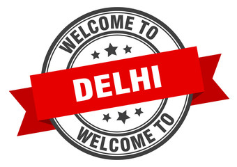 Delhi stamp. welcome to Delhi red sign
