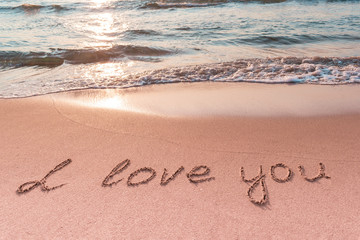 Valentine's day on the beach. Love message on the beach. Travel and holidays concept. Space for text.