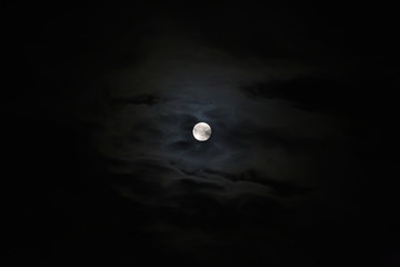Naklejka na ściany i meble Night sky with moon and clouds.