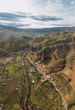 Aerial view of mountain chain and village landscape in Islallana, La Rioja, Spain