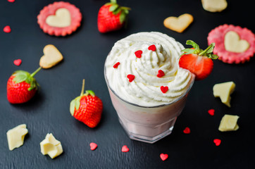 Strawberry hot white chocolate with whipped cream and strawberries