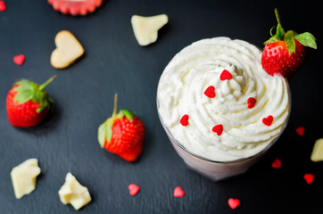 Strawberry hot white chocolate with whipped cream and strawberries