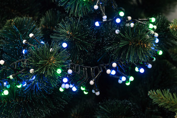 Obraz na płótnie Canvas Christmas festive garland tree branch. New Years Eve
