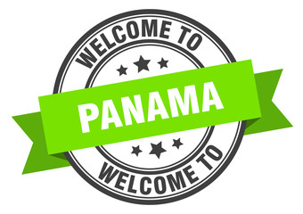 Panama stamp. welcome to Panama green sign