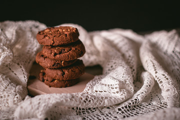 Delicious homemade chocolate cookies on a wooden table