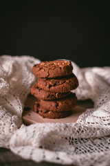 Delicious homemade chocolate cookies on a wooden table