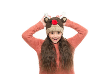 Cute accessories. Girl wear winter theme accessory. Christmas time. Fun and joy. Festive spirit. Cheerful kid. Playful cutie. Why children seems cute. Adorable baby wear cute winter knitted hat