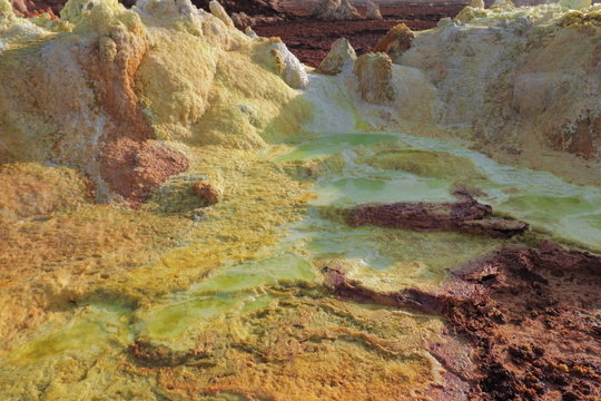Landscape of minerals and acid pools on the surface of a volcano in Dallol, Ethiopia