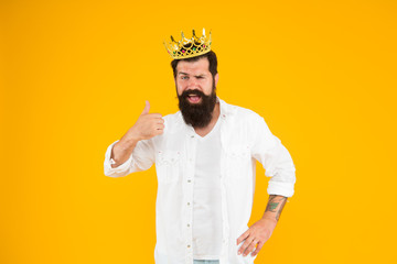 reward concept. brutal guy prince yellow background. King of party. Egoist selfish man. Superstar concept. Royal status. Sense of self importance. Love yourself. Holiday carnival celebration