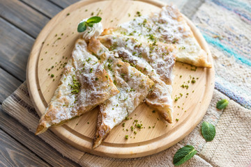 Traditional Turkish Pastry Dessert with Clotted Cream and Pistachios, Katmer