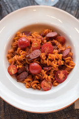 Red Fusilli Pasta with Sausages, Fresh Tomatoes and Tomato Sauce