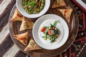 Middle Eastern Assorted Cold Appetizers, Meze. Tabbouleh and Spinach with Yogurt
