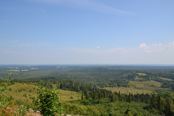 Fototapeta na wymiar summer day: view of the east side from the observation deck of the Belogorsky monastery in the Perm region