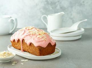 sweet bread covered with melted raspberry chocolate