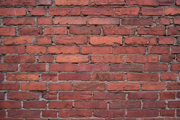 Old red brick wall. Grunge red vintage background.