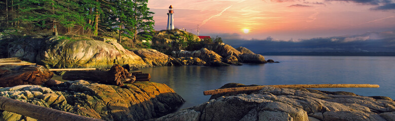 Whytecliff Park in Greater Vancouver British Columbia Canada in the Pacific North West featuring still calm waters of the ocean and a path of rocks leading to an island.  Featuring cityscapes. - 305558996