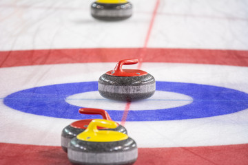 Curling rock on the ice