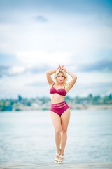 Female model in bikini on nature background