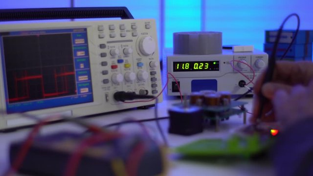 debugging and adjust electronic microcontrollers with arduino system in electronics laboratory - Powered by Adobe