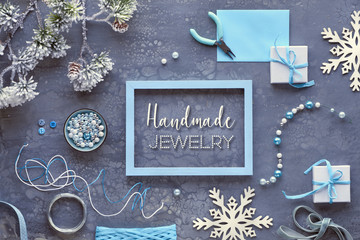 Making handmade jewelry for friends as Winter holiday gifts. Creative diy craft hobby. Flat lay on...