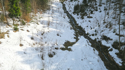 wonderful snowy mountain landscape in early spring