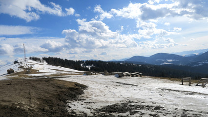 wonderful snowy mountain landscape in early spring