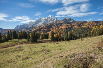 Fototapeta na wymiar Civetta mount, one of the highest peaks among the Italian Dolomites, at fall