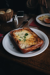 Lasagne on a restaurant table