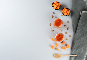 Pumpkin confiture on the light gray background.