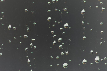 Window glas with rain drops texture.
