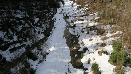 wonderful snowy mountain landscape in early spring