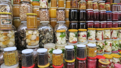 Delicious multi-colored jars with pickles