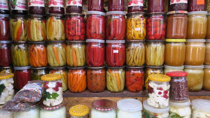 Delicious multi-colored jars with pickles