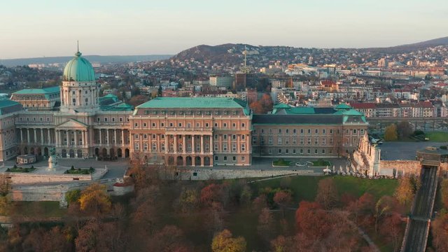Budapest, Hungary - 4K aerial view of drone flying sideways at Buda Castle Royal Palace on a sunny autumn morning