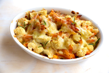 Cheese bakded cauliflower and red lentils spirals