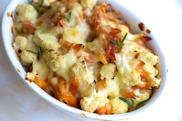 Cheese bakded cauliflower and red lentils spirals