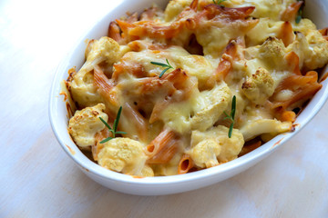 Cheese bakded cauliflower and red lentils spirals