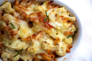 Cheese bakded cauliflower and red lentils spirals