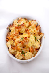 Cheese bakded cauliflower and red lentils spirals