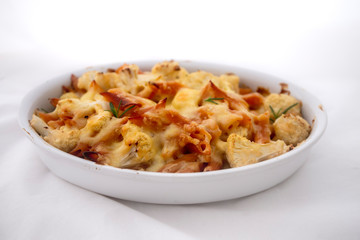 Cheese bakded cauliflower and red lentils spirals