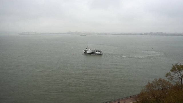 New York, New York / USA - November 18, 2019 : Statue of liberty cruise ship view form liberty island