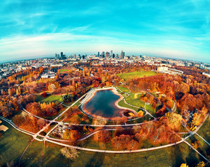 A beautiful panoramic view of the sunset in a fabulous November autumn evening at sunset from drone at Pola Mokotowskie in Warsaw, Poland - Mokotow Field is a large park called 