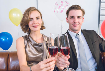 A couple is enjoying a romantic party.