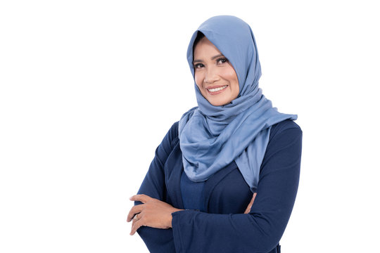 Pose Of Old Hijab Woman With Crossed Hands And Smile Look At Camera At Isolated Background