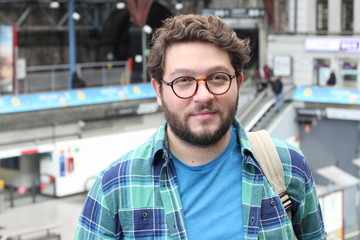 Large built man looking at camera 