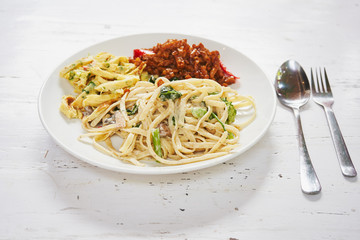  Close up custome made pasta dish plate on the white background