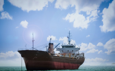 Logistics and transportation of International Container Cargo ship in the ocean at Sunshine sky, Freight Transportation, Shipping