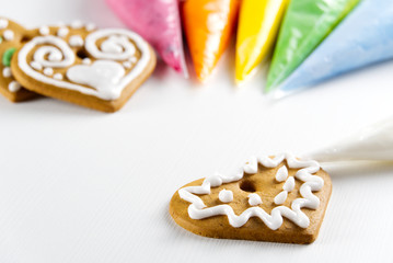 Christmas gingerbread cookies with colored sweet icing. copy space